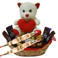 Online Rakhi Gift in India. 4 Dairy Milk 16 Ferrero Rocher Chocolates and 6 Inch Teddy Basket